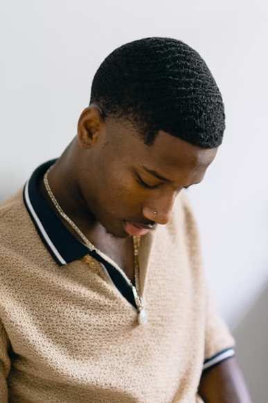 10 Hair Salon Services: Best in Nairobi 3 A guy who got hair cut at a hair salon